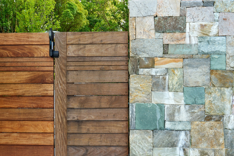 Close up of gate and stone fencing