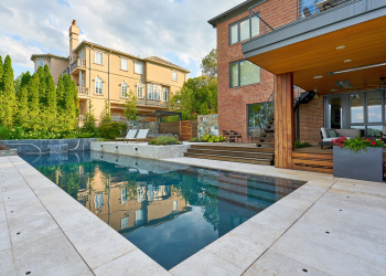 Landscape architecture blending plants, stones, and water features in Alexandria.