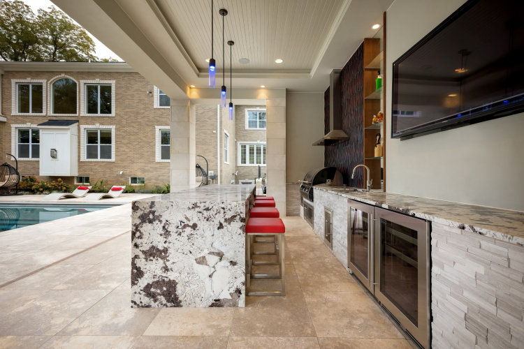 Impeccably designed outdoor kitchen and dining area in McLean