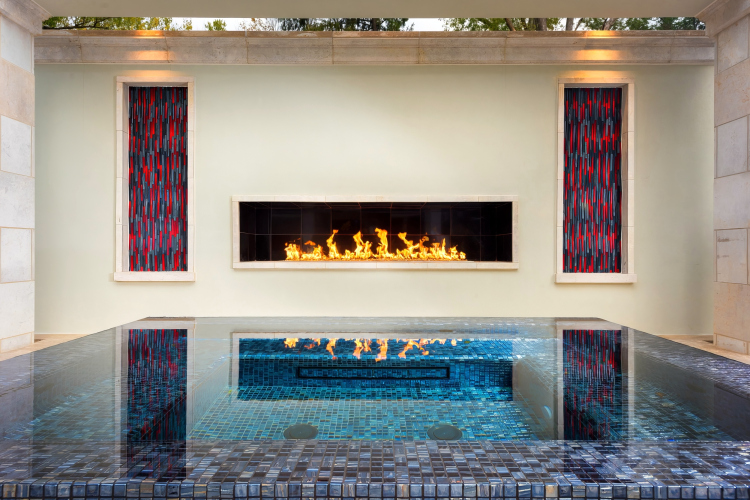 Outdoor fireplace, providing a warm and inviting atmosphere