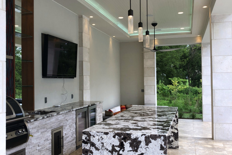 Outdoor kitchen countertops and lighting