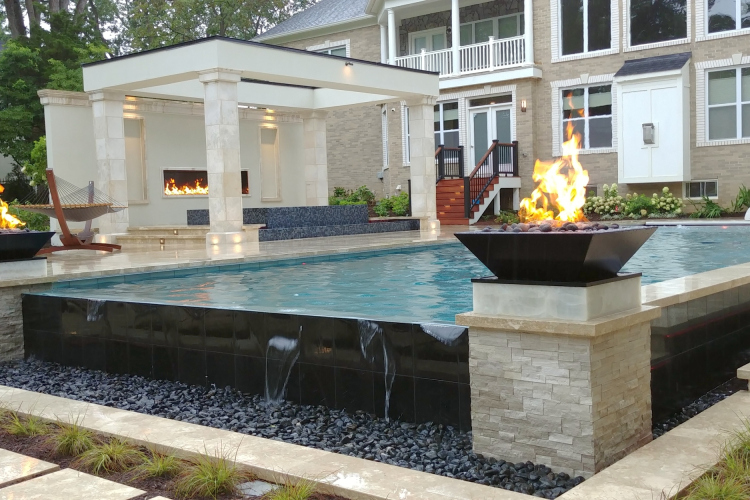 Custom pool design in McLean with a contemporary infinity edge