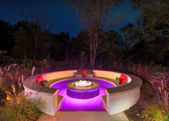 Captivating fire pit surrounded by comfortable seating, perfect for cozy evenings under the stars.