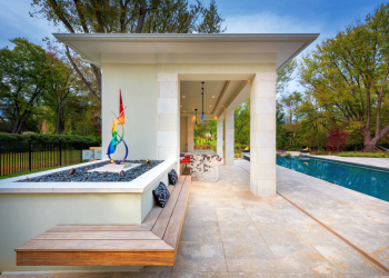 Sculptural accents and artistic touches adding visual interest and sophistication to the poolside ambiance.