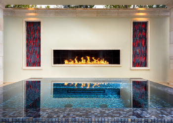 Outdoor fireplace, providing a warm and inviting atmosphere