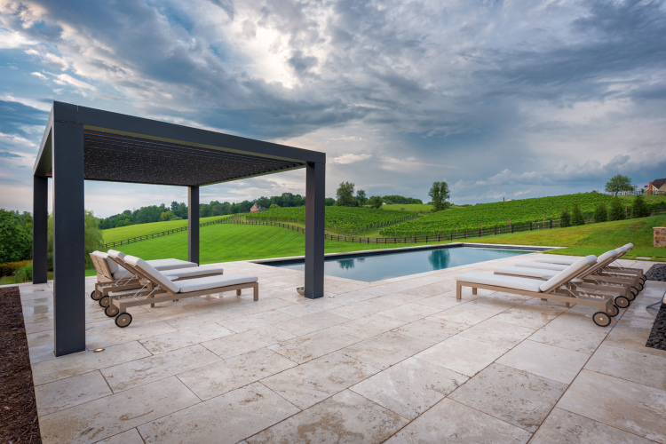 Modern Farmhouse Backyard Patio Design with Seating and Custom Pool Design