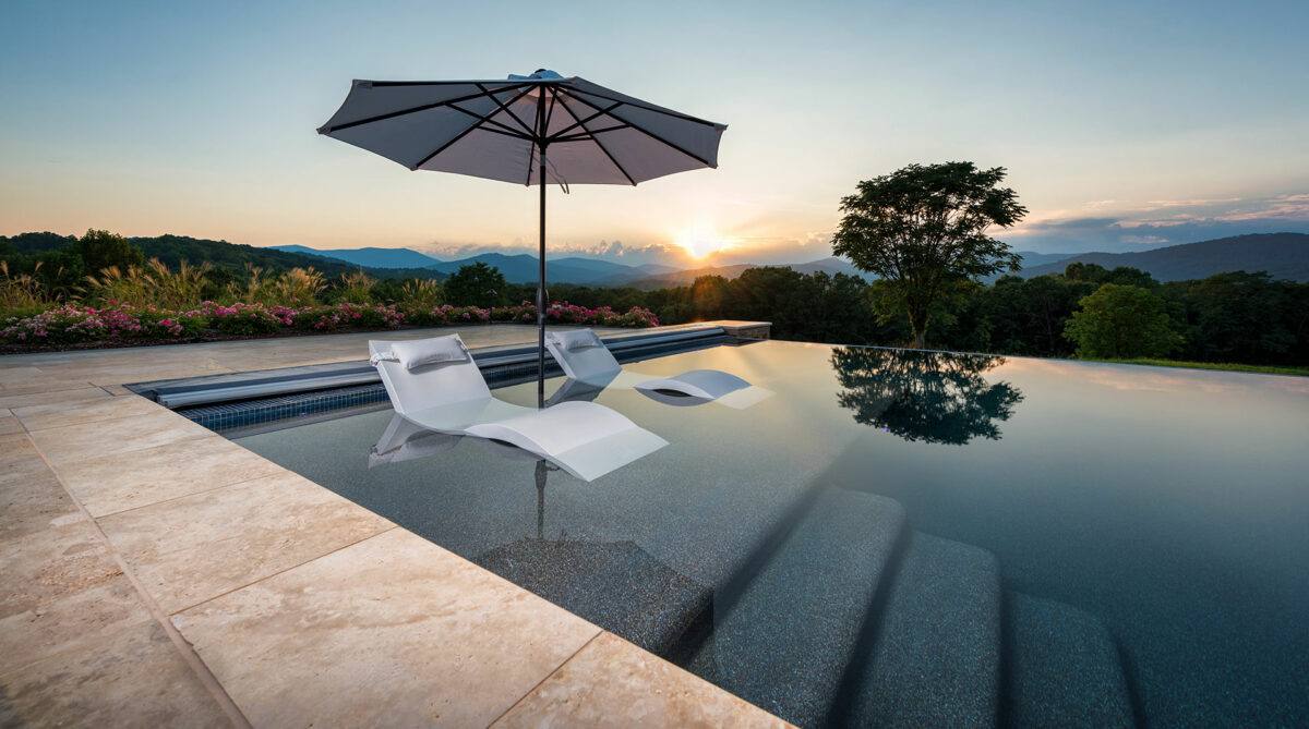 landscaping company Arlington, VA installed luxury pool overlooking mountains and sunset