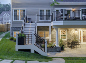 Under custom deck built in Arlington, VA including stairs with outdoor lighting
