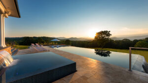 landscaping company Arlington, VA installed luxury pool overlooking mountains and sunset