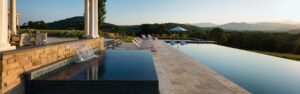landscaping company Arlington, VA installed luxury pool overlooking mountains and sunset