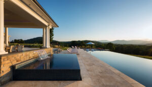 landscaping company Arlington, VA installed luxury pool overlooking mountains and sunset