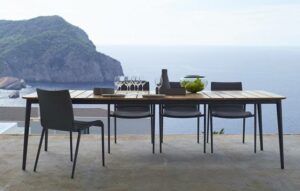 Table outside on patio overlooking water