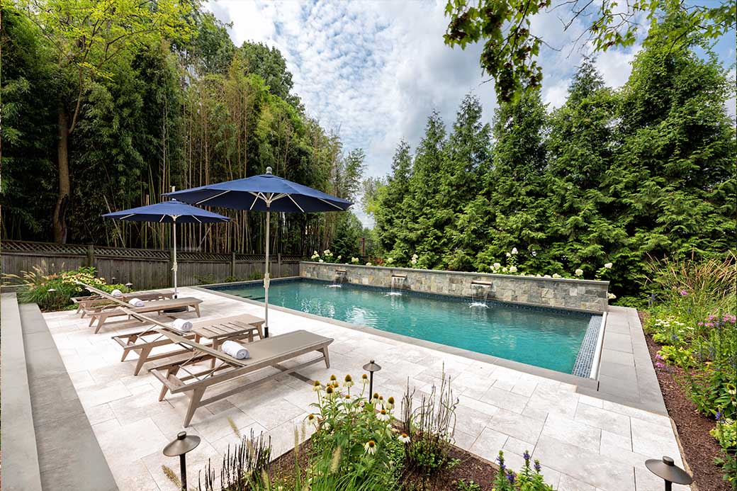 outdoor pool in backyard receives Pool Renovation: Revitalizing Your Pool's Appeal in Arlington, Great Falls, Leesburg, McLean, Sterling, VA, Washington, D.C